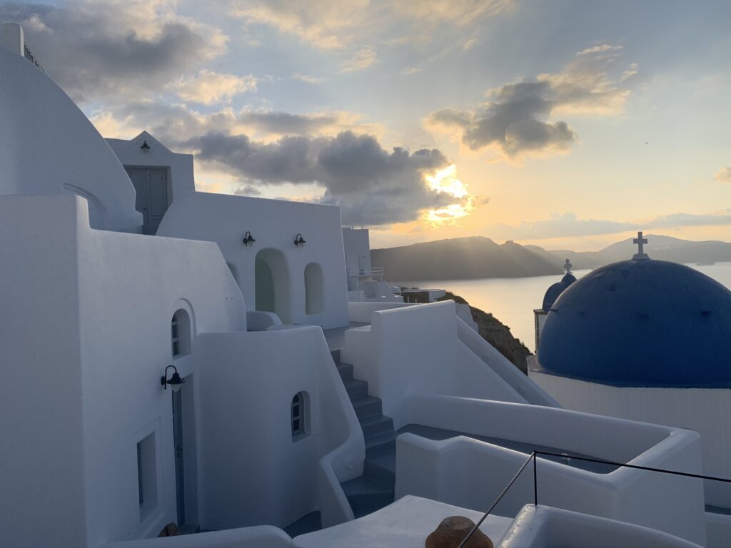 Watching the sunrise in Oia 